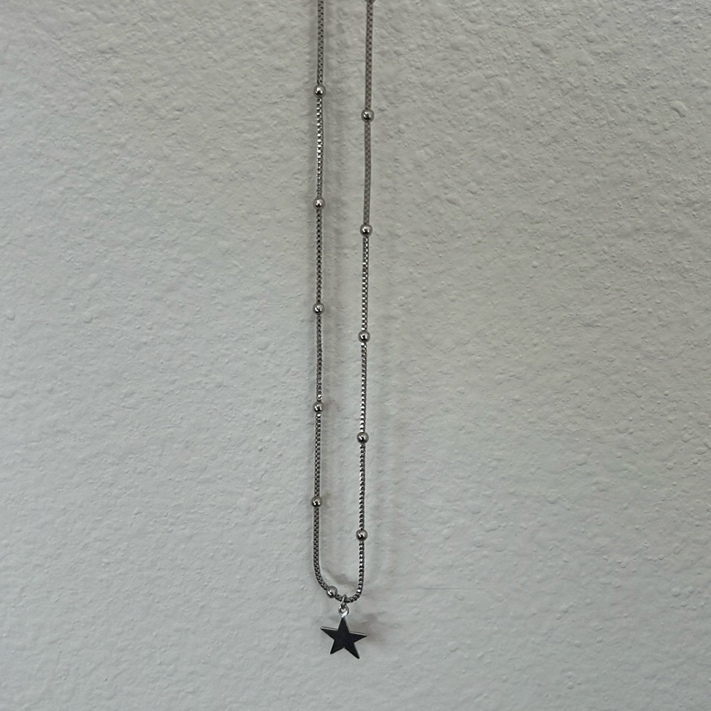 Long silver star necklace